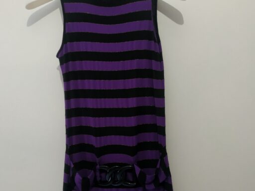 Maglia smanicata lunga dolcevita