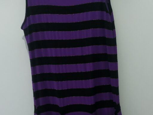 Maglia smanicata lunga dolcevita