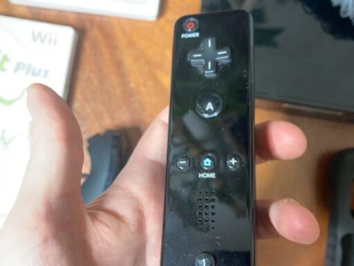 Nintendo Wii con balance board, 2 joystick e 3 giochi