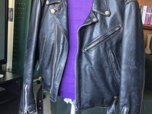 Chiodo unisex imbottito in pelle nera