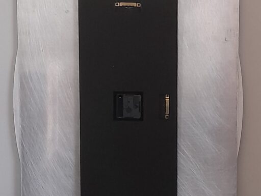 Orologio da parete design “rosone” su base silver