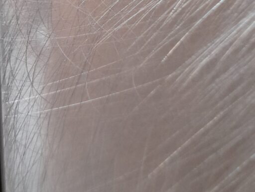 Orologio da parete design “rosone” su base silver