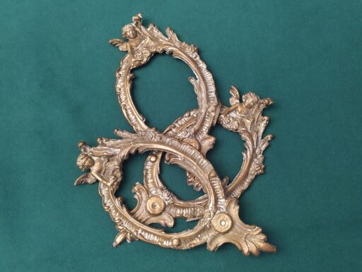 Cornici in ottone con putti