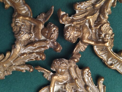 Cornici in ottone con putti