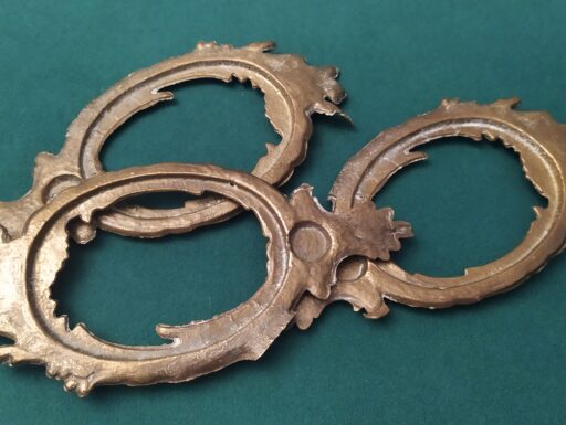 Cornici in ottone con putti