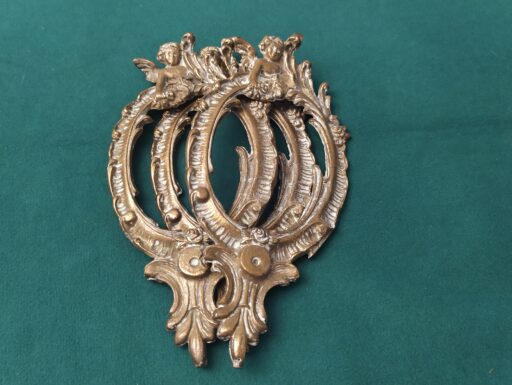 Cornici in ottone con putti