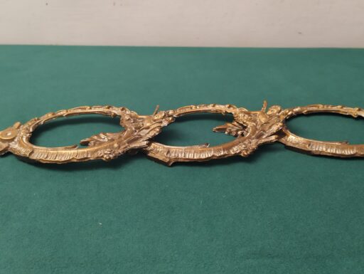 Cornici in ottone con putti