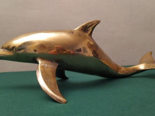 Delfino d’epoca in ottone