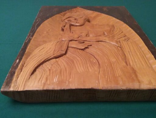 Scultura d’epoca su tavola legno