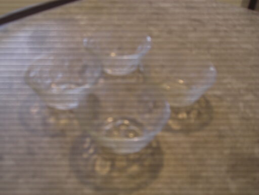 Coppette di vetro decorate. lotto di quattro.