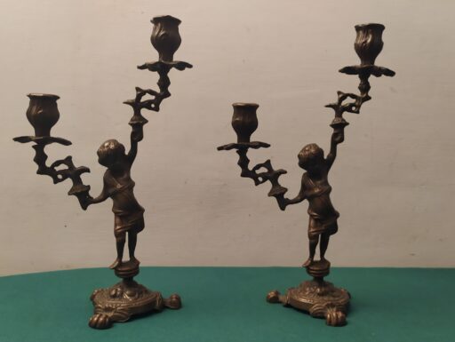 Candelabri ottone lavorati a sbalzo