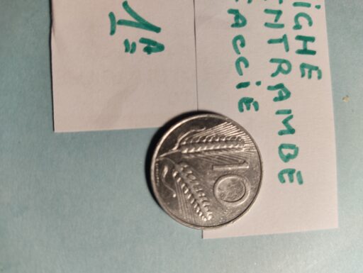 Monete italane e internazionali- £ 10 con difetto di conio